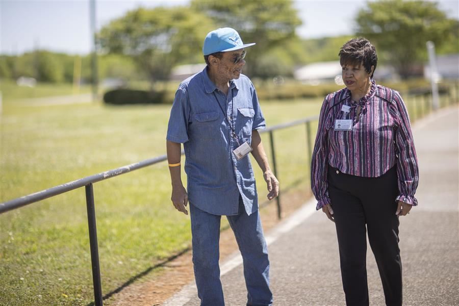  Wanda Jeffries and a PEARL client take advantage of the beautiful weather for a recent session.